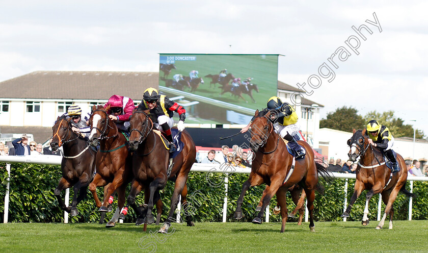 Global-Applause-0001 
 GLOBAL APPLAUSE (3rd left, Gerald Mosse) beats EL ASTRONAUTE (2nd left) and ENCORE D'OR (2nd right) in The D C Training And Development Services Scarbrough Stakes
Doncaster 12 Sep 2018 - Pic Steven Cargill / Racingfotos.com