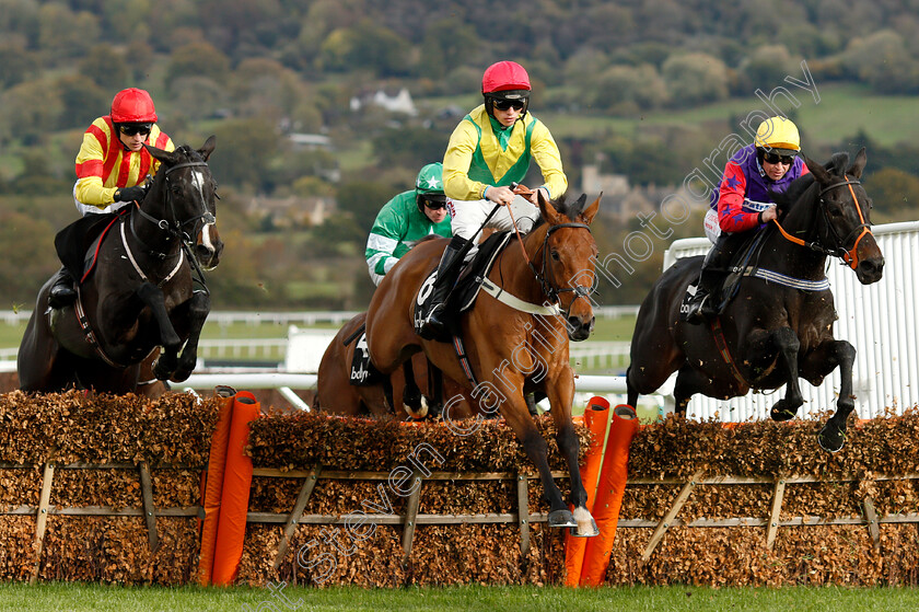 Sizing-Cusimano-0002 
 SIZING CUSIMANO (centre, Harry Cobden) jumps with HAVANA BEAT (right) and GRAGEELAGH GIRL (left)
Cheltenham 26 Oct 2018 - Pic Steven Cargill / Racingfotos.com