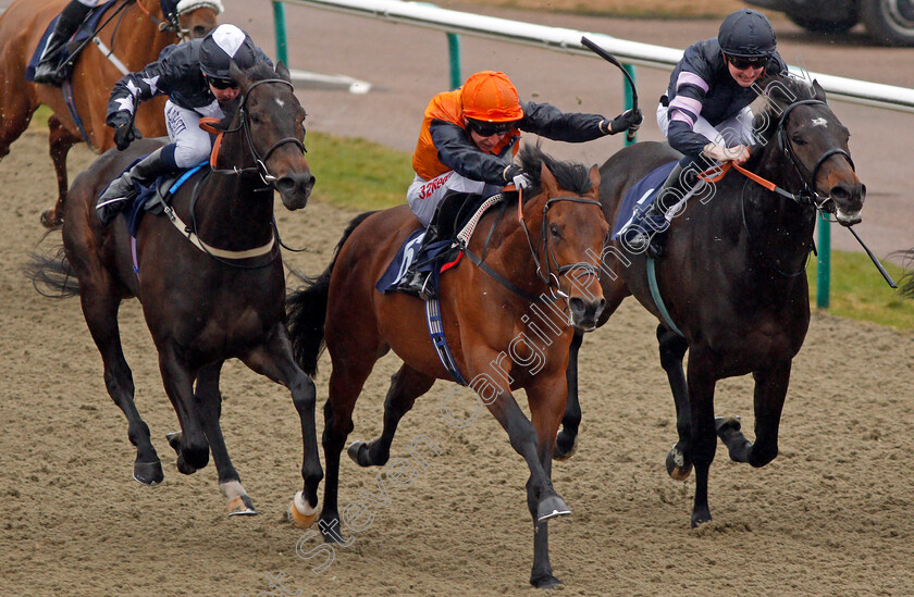 Marshal-Dan-0006 
 MARSHAL DAN (centre, Luke Morris) beats GOLDEN FOOTSTEPS (left) and CLOUD EIGHT (right) in The 32Redpoker.com Handicap Lingfield 14 Feb 2018 - Pic Steven Cargill / Racingfotos.com