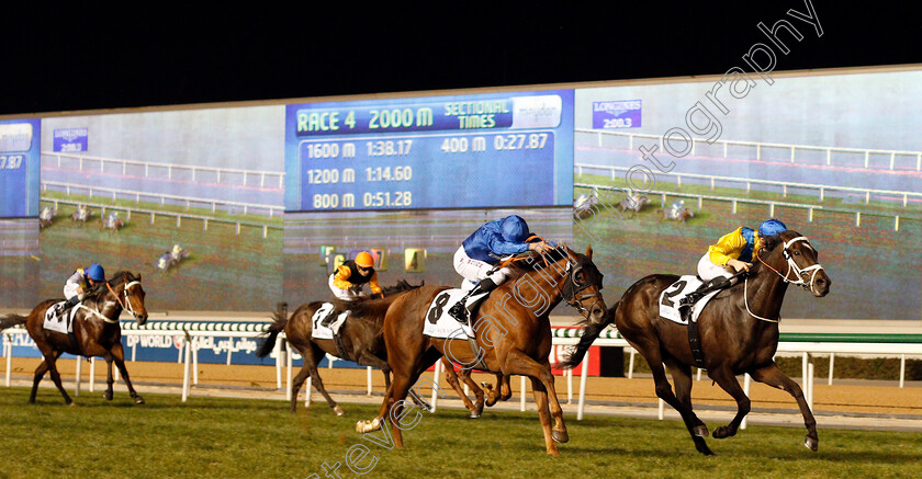 Light-The-Lights-0003 
 LIGHT THE LIGHTS (Christophe Soumillon) beats BLAIR HOUSE (centre) in The Mubadala Global Trophy Handicap Meydan 18 Jan 2018 - Pic Steven Cargill / Racingfotos.com