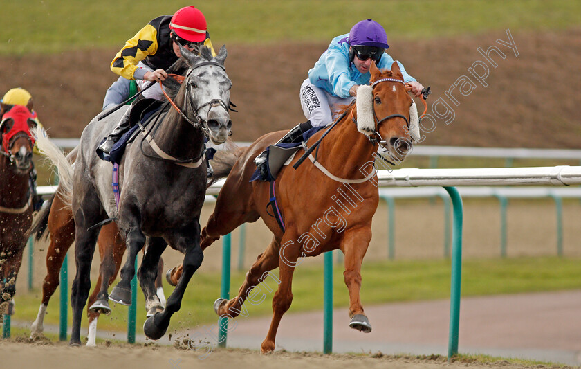 Locommotion-0006 
 LOCOMMOTION (left, Luke Morris) beats SOARING SPIRITS (right) in The Play Jackpot Games At sunbets.co.uk/vegas Handicap Lingfield 30 Dec 2017 - Pic Steven Cargill / Racingfotos.com