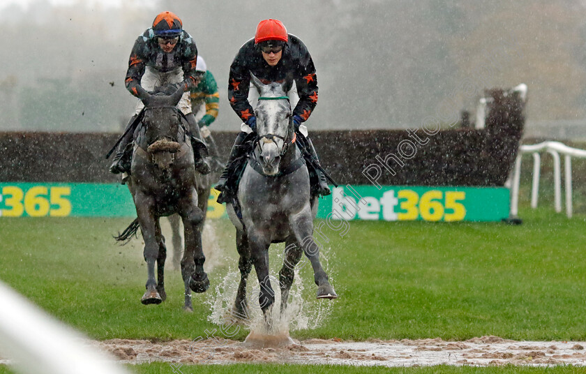 Heritier-0003 
 BEMPTON CLIFFS (Alan Johns) leads winner HERITIER (left, Fergus Gregory) through the flooded track in the Pertemps Network Handicap Chase
Market Rasen 17 Nov 2022 - pic Steven Cargill / Racingfotos.com