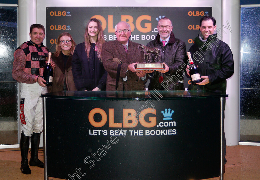 Sensulano-0004 
 Presentation to Noel Williams, Barry Geraghty and owners for The OLBG.com Mares Handicap Hurdle won by SENSULANO
Cheltenham 15 Dec 2018 - Pic Steven Cargill / Racingfotos.com