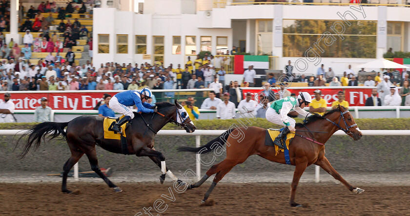 Kowaiyess-0003 
 KOWAIYESS (Pat Cosgrave) beats ALRAASED (left) in The Emirates SkyCargo Handicap Jebel Ali, Dubai 9 Feb 2018 - Pic Steven Cargill / Racingfotos.com