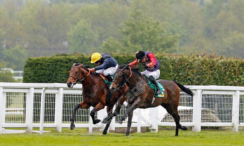 Crystal-Ocean-0004 
 CRYSTAL OCEAN (left, Ryan Moore) beats FABRICATE (right) in The bet365 Gordon Richards Stakes Sandown 27 Apr 2018 - Pic Steven Cargill / Racingfotos.com