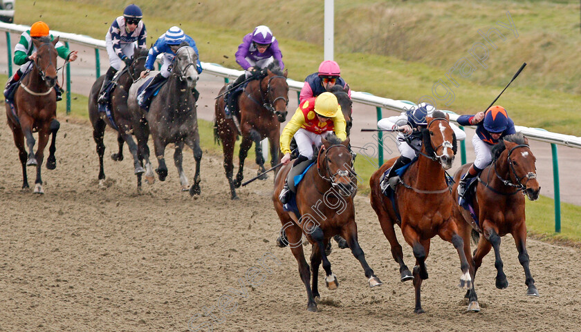 Hasanoanda-0001 
 HASANOANDA (2nd right, Robert Havlin) beats AMBIENT (centre) and CRAVING (right) in The 32Red.com Novice Median Auction Stakes Lingfield 6 Jan 2018 - Pic Steven Cargill / Racingfotos.com