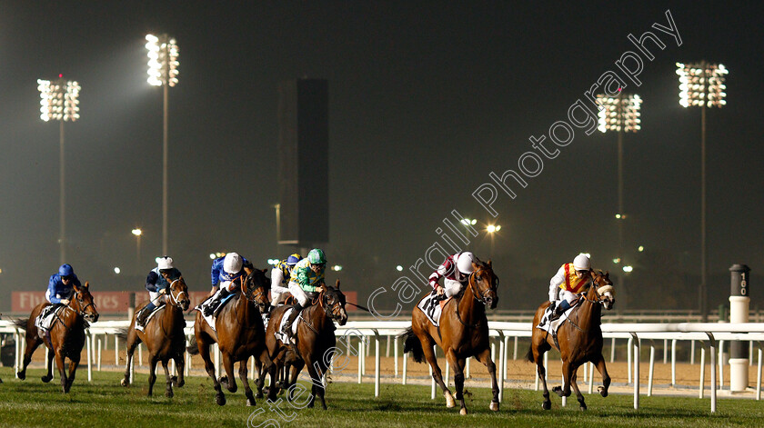 Wasim-0001 
 WASIM (2nd right, Adrie De Vries) beats ZAMAN (left) and CENTENARY DIAMOND (right) in The Meydan Classic Trial Meydan 8 Feb 2018 - Pic Steven Cargill / Racingfotos.com