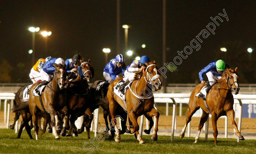 Baroot-0001 
 BAROOT (centre, Adrie De Vries) beats SILENT ATTACK (left) and ON THE WARPATH (right) in The Cepsa Energy Cup Handicap
Meydan 10 Jan 2019 - Pic Steven Cargill / Racingfotos.com