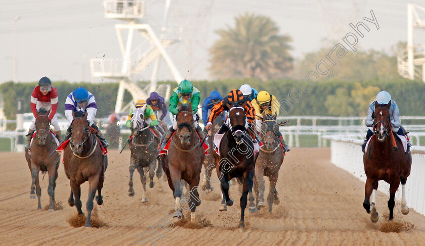 Kimbear-0003 
 KIMBEAR (centre, Pat Dobbs) beats SECRET AMBITION (2nd left) MUSAWAAT (left) and HEAVY METAL (right) in The Burj Nahaar Meydan Dubai 10 Mar 2018 - Pic Steven Cargill / Racingfotos.com