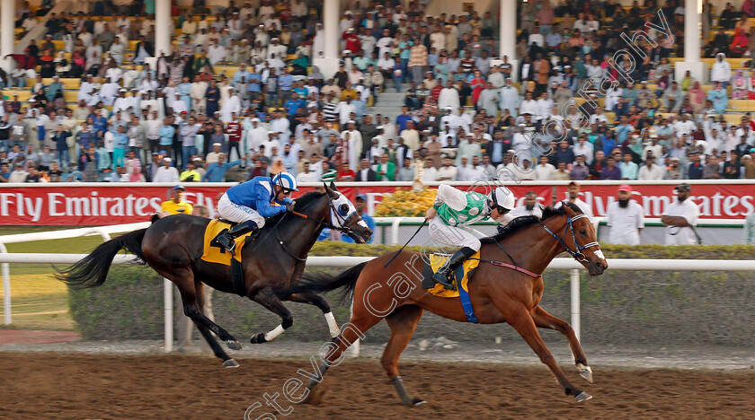 Kowaiyess-0002 
 KOWAIYESS (Pat Cosgrave) beats ALRAASED (left) in The Emirates SkyCargo Handicap Jebel Ali, Dubai 9 Feb 2018 - Pic Steven Cargill / Racingfotos.com