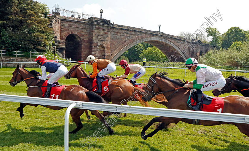 Democracy-Dilemma-0001 
 DEMOCRACY DILEMMA (right, Tom Marquand) chases the leaders on his way to winning The CAA Stellar Handicap
Chester 9 May 2024 - Pic Steven Cargill / Racingfotos.com