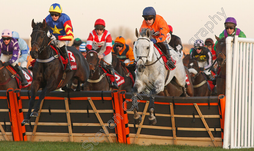 Champers-On-Ice-0001 
 CHAMPERS ON ICE (right, Tom Scudamore) beats VIVE LE ROI (left) in The Ladbrokes Handicap Hurdle
Newbury 29 Nov 2019 - Pic Steven Cargill / Racingfotos.com