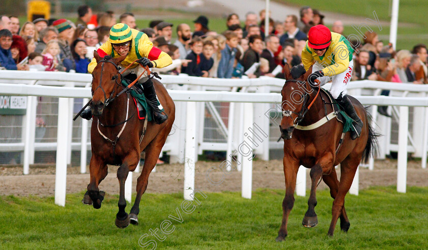 Herecomestheboom-0004 
 HERECOMESTHEBOOM (left, Paddy Brennan) beats AINCHEA (right) in The Jockey Club Venues Standard Open National Hunt Flat Race Cheltenham 28 Oct 2017 - Pic Steven Cargill / Racingfotos.com