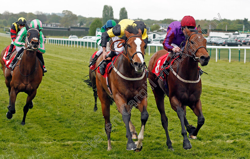 Haddaf-0004 
 HADDAF (centre, Ryan Moore) beats DIAMOND DOUGAL (right) in The bet365 Handicap Sandown 27 Apr 2018 - Pic Steven Cargill / Racingfotos.com