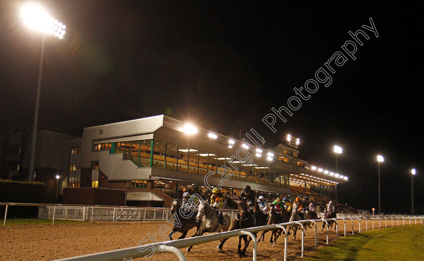 Watersmeet-0001 
 WATERSMEET (centre, Joe Fanning) disputing the lead on his way to winning The Betway Live Casino Conditions Stakes Wolverhampton 15 Jan 2018 - Pic Steven Cargill / Racingfotos.com