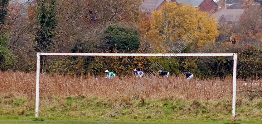 Push-The-Button-0005 
 PUSH THE BUTTON (Finn Lambert) leads down the back straight on his way to winning The Olly Murphy Racing Novices Hurdle
Warwick 22 Nov 2023 - Pic Steven Cargill / Racingfotos.com