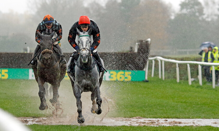 Heritier-0004 
 BEMPTON CLIFFS (Alan Johns) leads winner HERITIER (left, Fergus Gregory) through the flooded track in the Pertemps Network Handicap Chase
Market Rasen 17 Nov 2022 - pic Steven Cargill / Racingfotos.com