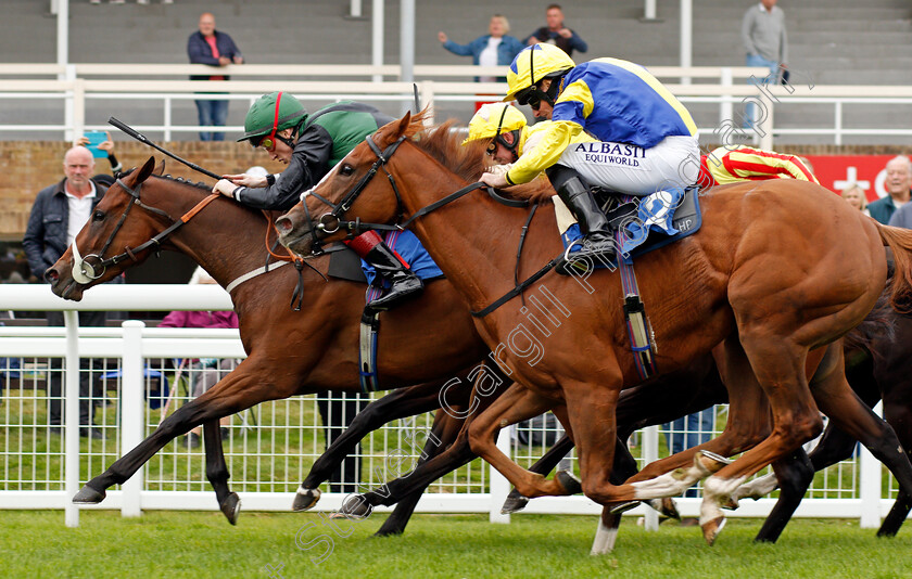 Chocoya-0003 
 CHOCOYA (right, Ryan Moore) beats SILENT FLAME (left) in The European Bloodstock News EBF Lochsong Fillies Handicap
Salisbury 2 Sep 2021 - Pic Steven Cargill / Racingfotos.com