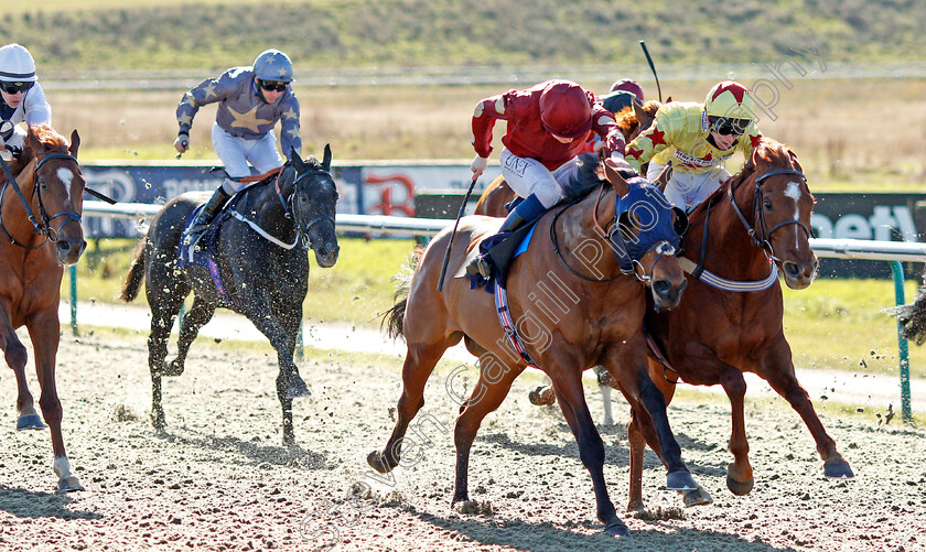 French-Minstrel-0004 
 FRENCH MINSTREL (centre, Callum Shepherd) beats LIBBRETTA (right) in The Betway Casino Handicap
Lingfield 26 Feb 2021 - Pic Steven Cargill / Racingfotos.com