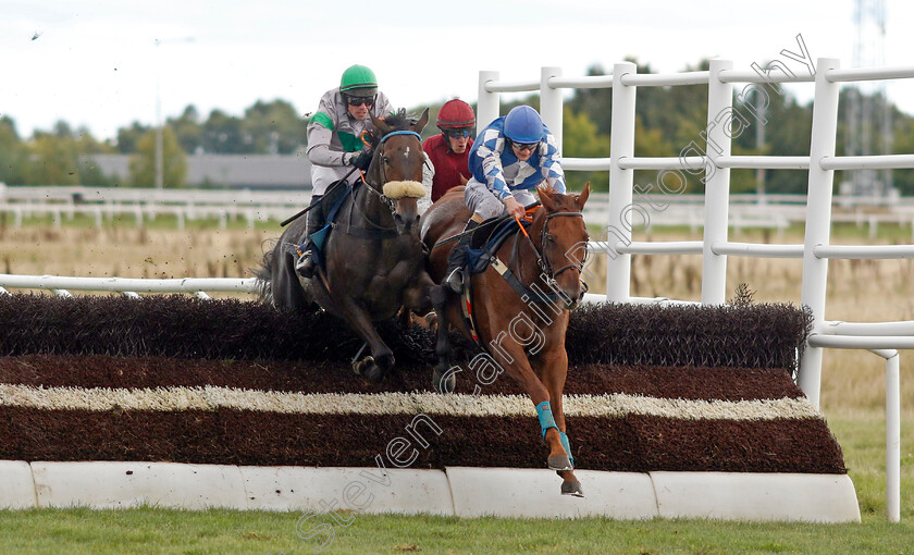 Her-Him-0001 
 HER HIM (left, Henrik Engblom) beats LURIS PEGASUS (right) in The H.M. Konungens Pris
Bro Park, Sweden 18 Sep 2022 - Pic Steven Cargill / Racingfotos.com