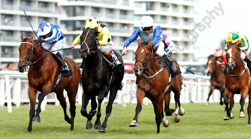 Owney-Madden-0001 
 OWNEY MADDEN (right, Jason Watson) beats WRITTEN BROADCAST (centre) and FOX DUTY FREE (left) in The bet365 EBF Novice Stakes
Newbury 20 Jul 2019 - Pic Steven Cargill / Racingfotos.com