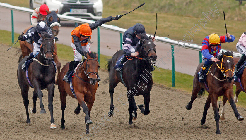 Marshal-Dan-0002 
 MARSHAL DAN (2nd left, Luke Morris) beats GOLDEN FOOTSTEPS (left) CLOUD EIGHT (2nd right) and CRISTAL PALLAS CAT (right) in The 32Redpoker.com Handicap Lingfield 14 Feb 2018 - Pic Steven Cargill / Racingfotos.com