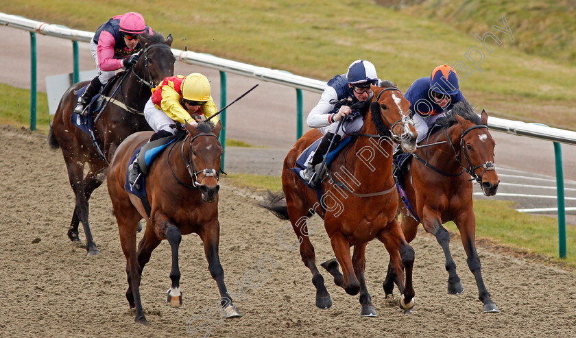 Hasanoanda-0006 
 HASANOANDA (centre, Robert Havlin) beats AMBIENT (left) and CRAVING (right) in The 32Red.com Novice Median Auction Stakes Lingfield 6 Jan 2018 - Pic Steven Cargill / Racingfotos.com