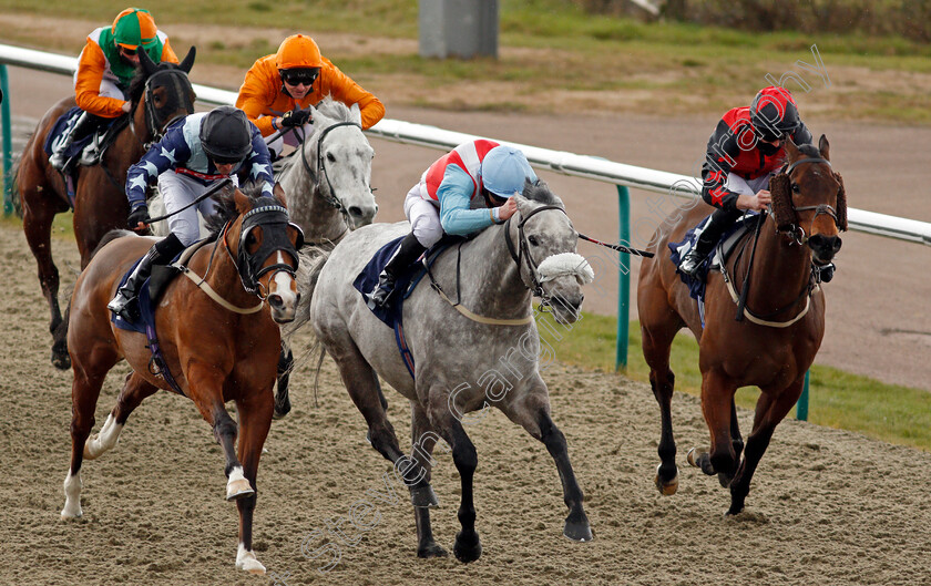 Thegreyvtrain-0003 
 THEGREYVTRAIN (centre, Martin Harley) beats SHINING (left) and BIG TIME MAYBE (right) in the Heed Your Hunch At Betway Handicap
Lingfield 6 Mar 2021 - Pic Steven Cargill / Racingfotos.com