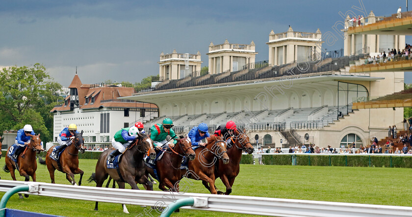 Rouhiya-0004 
 ROUHIYA (greeen, Maxime Guyon) wins The Emirates Poule d'Essai des Pouliches
Longchamp 12 May 2024 - Pic Steven Cargill / Racingfotos.com