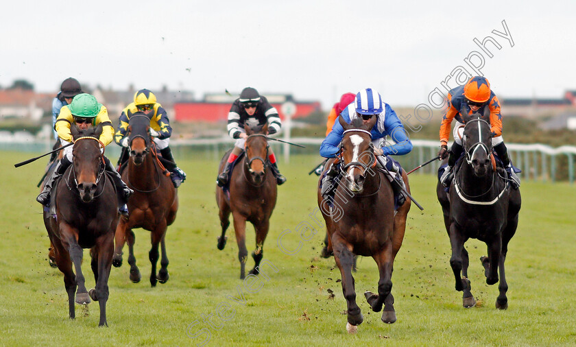 Talaaqy-0003 
 TALAAQY (2nd right, Jim Crowley) beats PUDS (left) and SPENNY'S LASS (right) in The British Stallion Studs EBF Fillies Novice Stakes Yarmouth 24 Oct 2017 - Pic Steven Cargill / Racingfotos.com