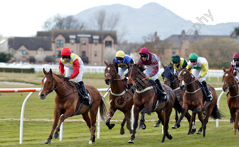 Musselburgh-0004 
 DRAGON MOUNTAIN leads the field down the back straight in the the Like Racing TV On Facebook Handicap won by CHAMPARISI (yellow sleeves, Sam James)
Musselburgh 2 Apr 2019 - Pic Steven Cargill / Racingfotos.com