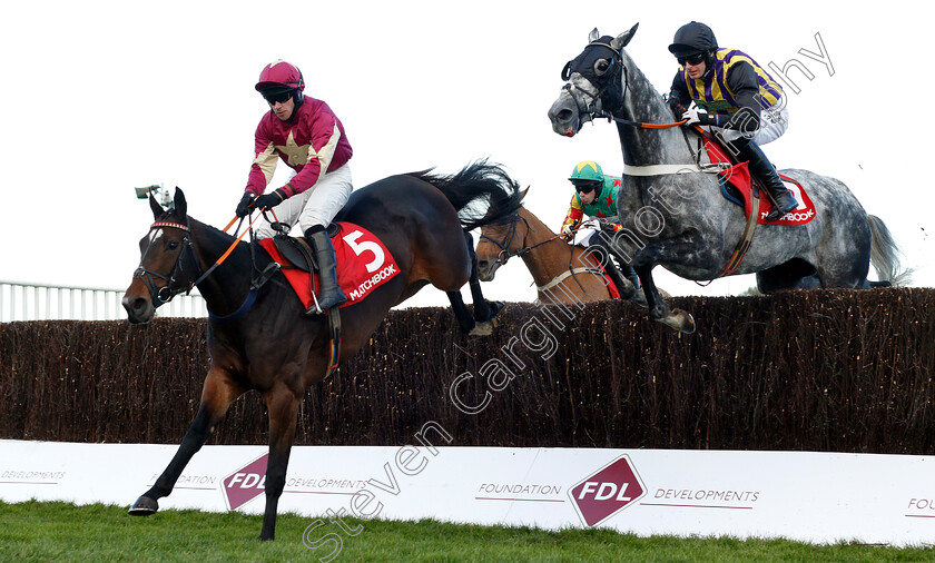 Treackle-Tart-0003 
 TREACKLE TART (left, Jonathan Burke) jumps with PICKAMIX (right) 
Cheltenham 26 Oct 2018 - Pic Steven Cargill / Racingfotos.com