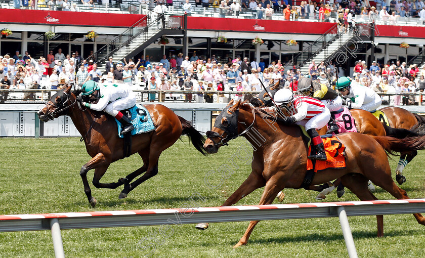 Time-Flies-By-0003 
 TIME FLIES BY (left, Trevor McCarthy) beats RISING PERRY (right) in Waiver Maiden Claimer
Pimlico, Baltimore USA, 17 May 2019 - Pic Steven Cargill / Racingfotos.com