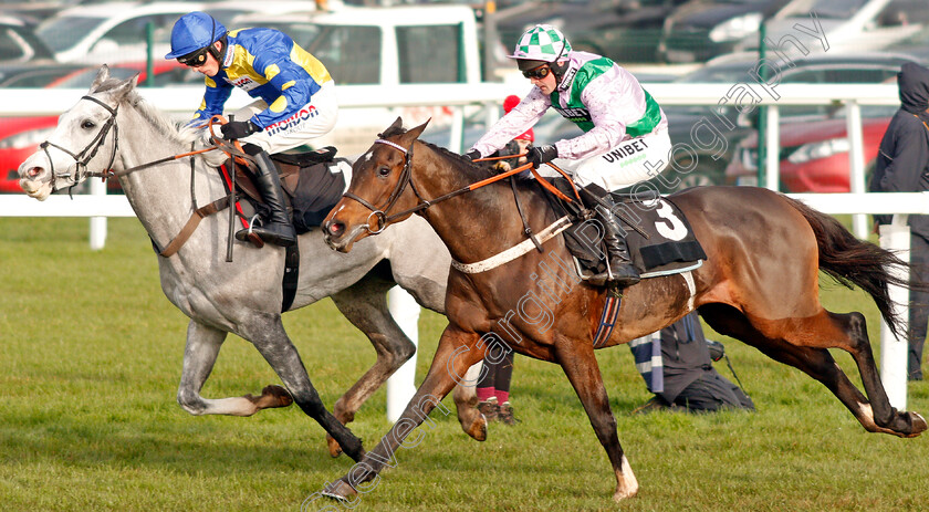 Floressa-0004 
 FLORESSA (right, Nico de Boinville) beats SILVER FOREVER (left) in The Ladbrokes Mares Novices Hurdle
Newbury 30 Nov 2019 - Pic Steven Cargill / Racingfotos.com