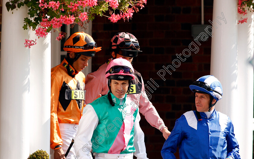 Jockeys-0001 
 Jockeys Jim Crowley, Pat Dobbs and Sean Levey leave the weighing room to ride at Sandown 1 Sep 2017 - Pic Steven Cargill / Racingfotos.com