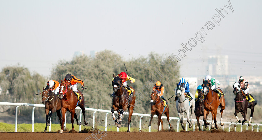 Lavaspin-0001 
 LAVASPIN (centre, Richard Mullen) wins The Roma Capannelle Maiden Jebel Ali 9 Mar 2018 - Pic Steven Cargill / Racingfotos.com