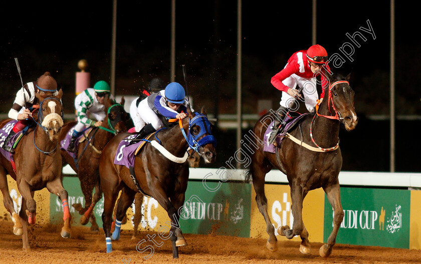 Sabeq hom-0001 
 SABEQ'HOM (Sibylle Vogt) beats ALSHATHERWAN (centre) in The International Jockeys Challenge Handicap Round4
King Abdulaziz Racetrack, Riyadh, Saudi Arabia 28 Feb 2020 - Pic Steven Cargill / Racingfotos.com