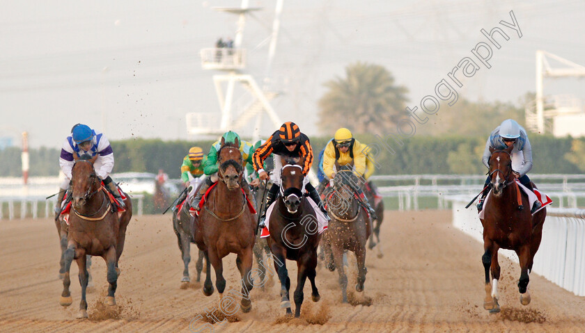 Kimbear-0004 
 KIMBEAR (centre, Pat Dobbs) beats SECRET AMBITION (2nd left) MUSAWAAT (left) and HEAVY METAL (right) in The Burj Nahaar Meydan Dubai 10 Mar 2018 - Pic Steven Cargill / Racingfotos.com