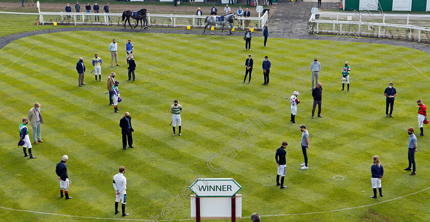 Pat-Smullen-silence-0003 
 Jockeys and staff observe a minute's silence in honour of Pat Smullen in the parade ring prior to the first race
Yarmouth 16 Sep 2020 - Pic Steven Cargill / Racingfotos.com