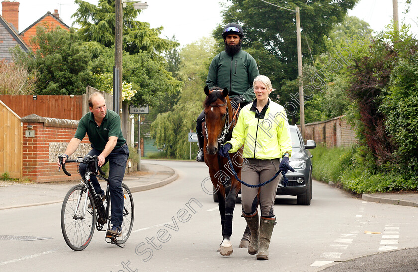 Knight-To-Behold-0014 
 KNIGHT TO BEHOLD, ridden by Mohammed Abdul Qazafi Mirza, walking home from the gallops with Christina Dunlop and trainer Harry Dunlop in preparation for The Investec Derby
Lambourn 31 May 2018 - Pic Steven Cargill / Racingfotos.com