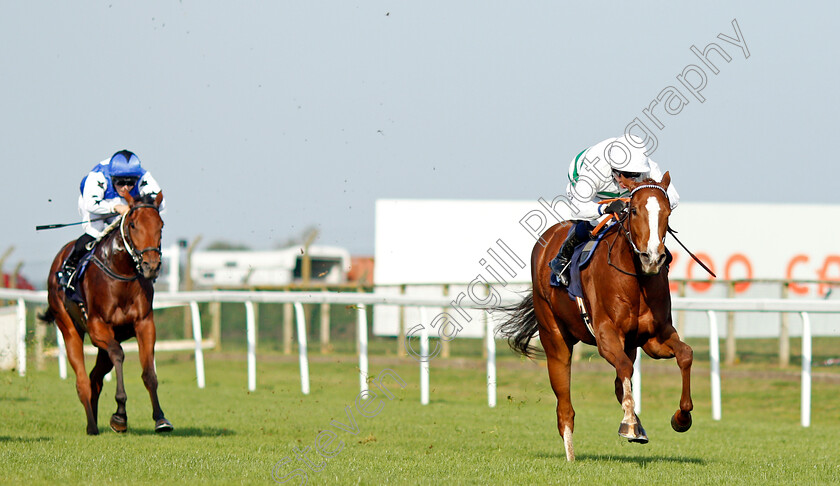 Heat-of-The-Moment-0003 
 HEAT OF THE MOMENT (Jim Crowley) wins The British EBF Fillies Novice Stakes
Yarmouth 19 Oct 2021 - Pic Steven Cargill / Racingfotos.com