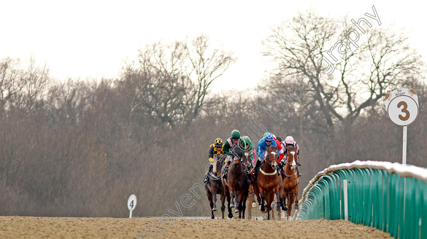 Wild-Flower-0001 
 WILD FLOWER (blue, Thore Hansen) leads the field down the hill during The Betway Handicap Lingfield 23 Feb 2018 - Pic Steven Cargill / Racingfotos.com