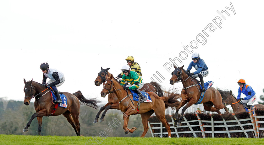 Relieved-Of-Duties-and-Kel-Histoire-0002 
 RELIEVED OF DUTIES (left, Danny Gilligan) leads KEL HISTOIRE (centre, Mark Walsh) SALVATOR MUNDI (jumping, obscured) and ARTIC LANE (right)
Punchestown 12 Jan 2025 - Pic Steven Cargill / Racingfotos.com