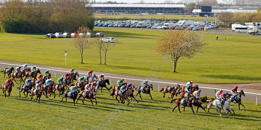 Corach-Rambler-0019 
 Approaching the 3rd fence in the Randox Grand National, winner CORACH RAMBLER (purple, centre, Derek Fox). 
Aintree 15 Apr 2023 - Pic Steven Cargill / Racingfotos.com